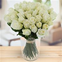60 roses blanches + vase