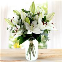 Bouquet de lys blancs et son vase